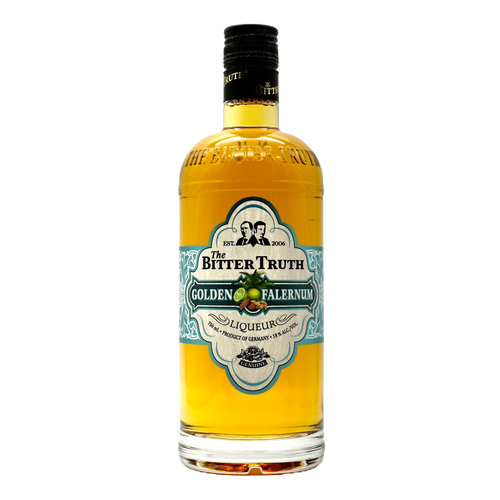 A bottle of Bitter Truth Golden Falernum Liqueur with a yellowish liquid visible through the clear glass. The label features the brand name and product name with a vintage style design.