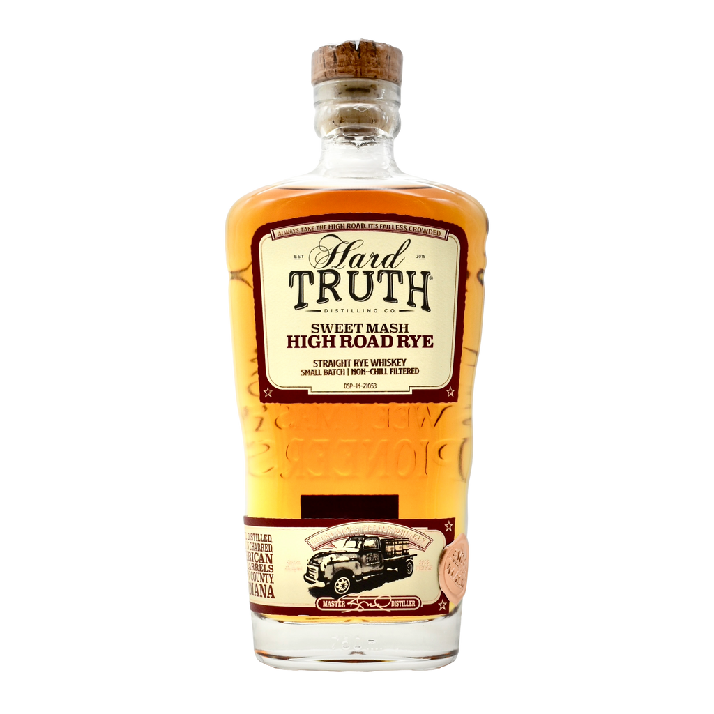 Bottle of Hard Truth Sweet Mash High Road Rye whiskey on a white background